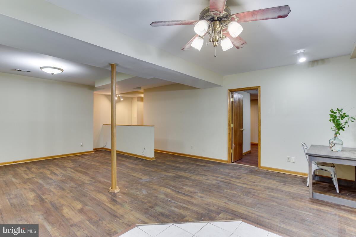 13185 Joy Road Lusby, MD 20657 - Photo 46 of 58 Plenty of room in this basement with nice floors.