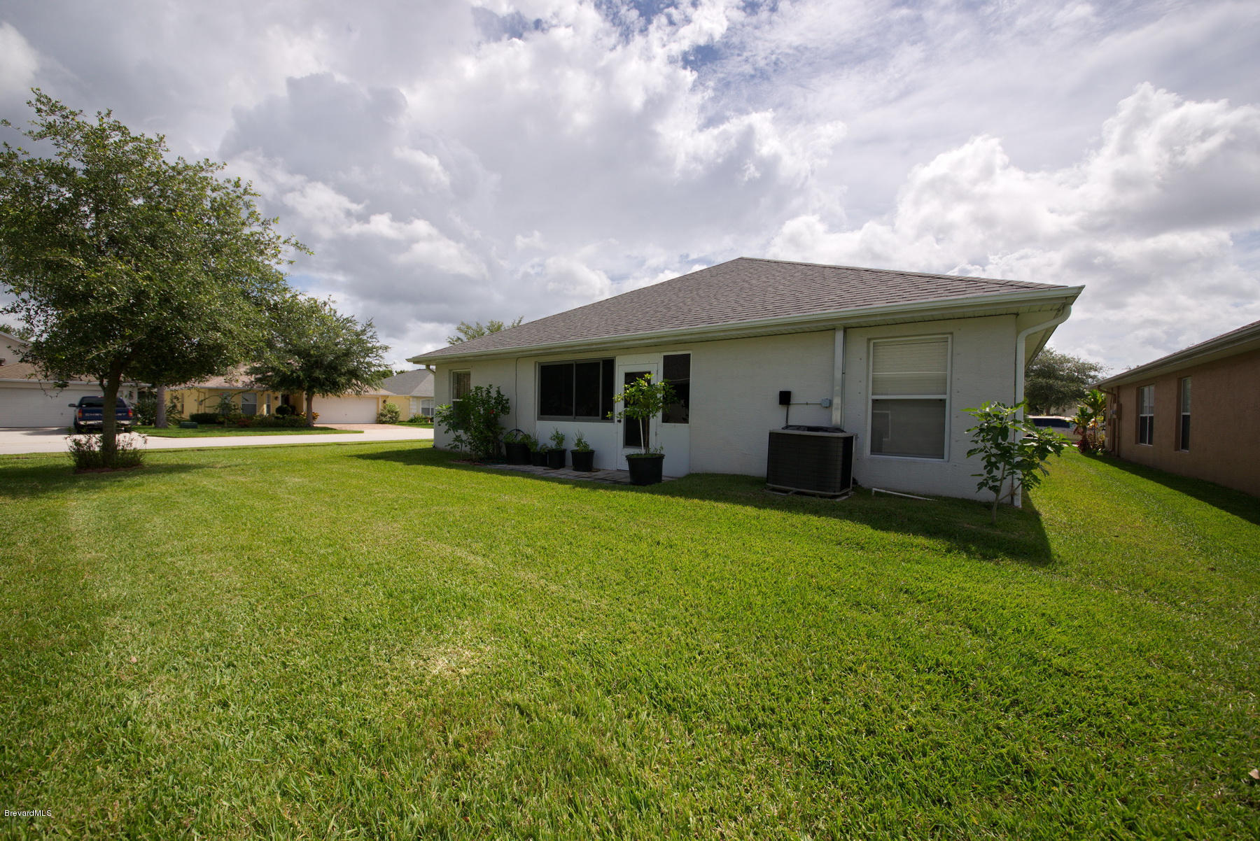 4500 Decatur Circle Melbourne, FL 32934 - Photo 14 of 14 Backyard_Enclosed Patio