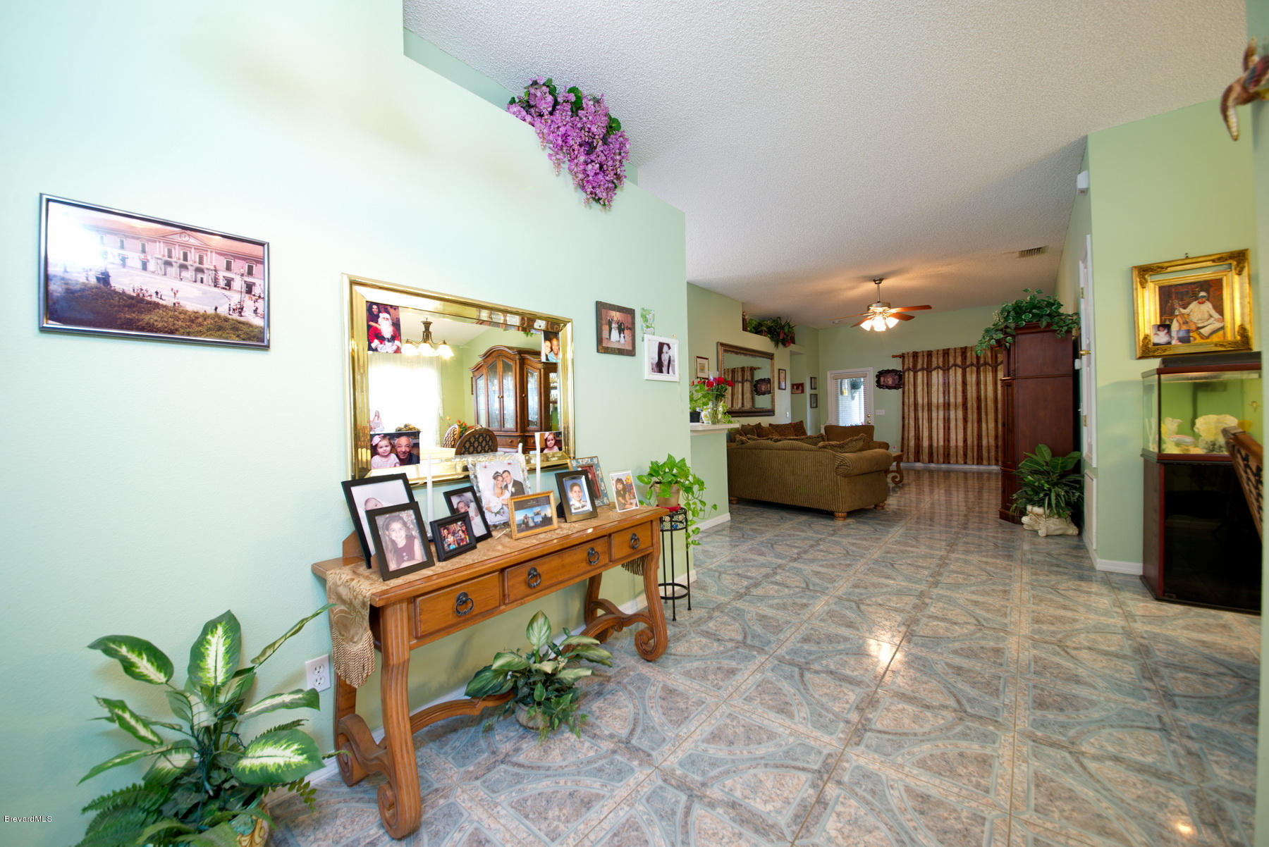 4500 Decatur Circle Melbourne, FL 32934 - Photo 3 of 14 Foyer_Beautiful tile in Living Areas