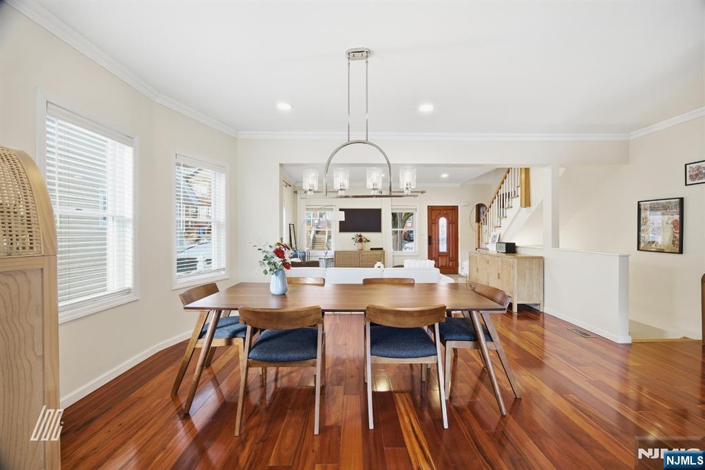331 Undercliff Avenue Edgewater, NJ 07020 - Photo 11 of 45 a view of a dining room with furniture window and wooden floor