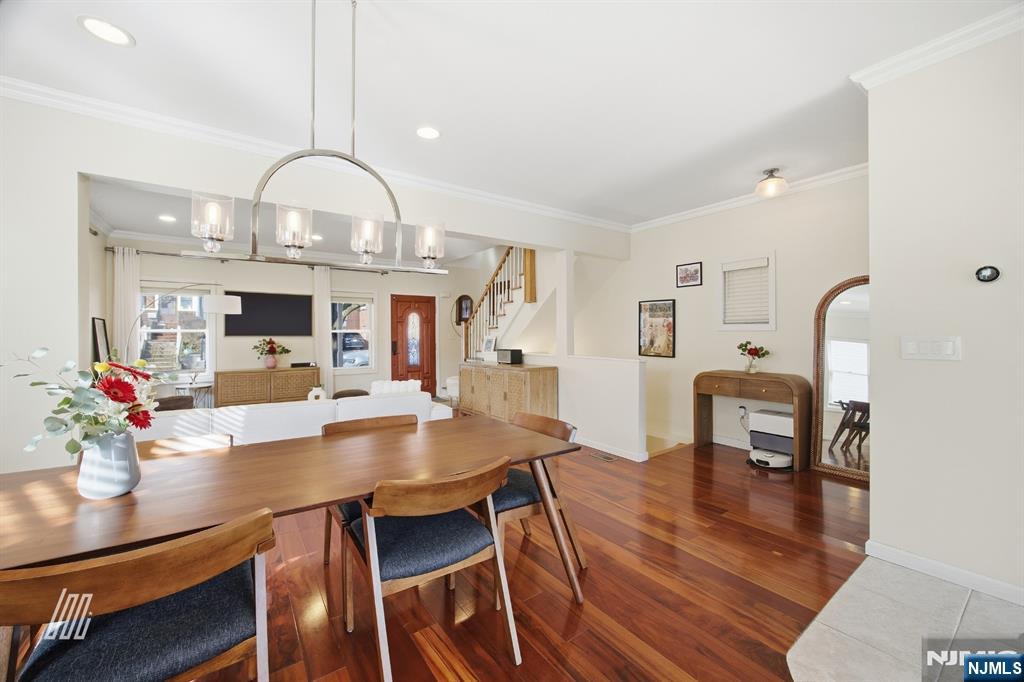 331 Undercliff Avenue Edgewater, NJ 07020 - Photo 12 of 45 a view of a dining room with furniture and wooden floor