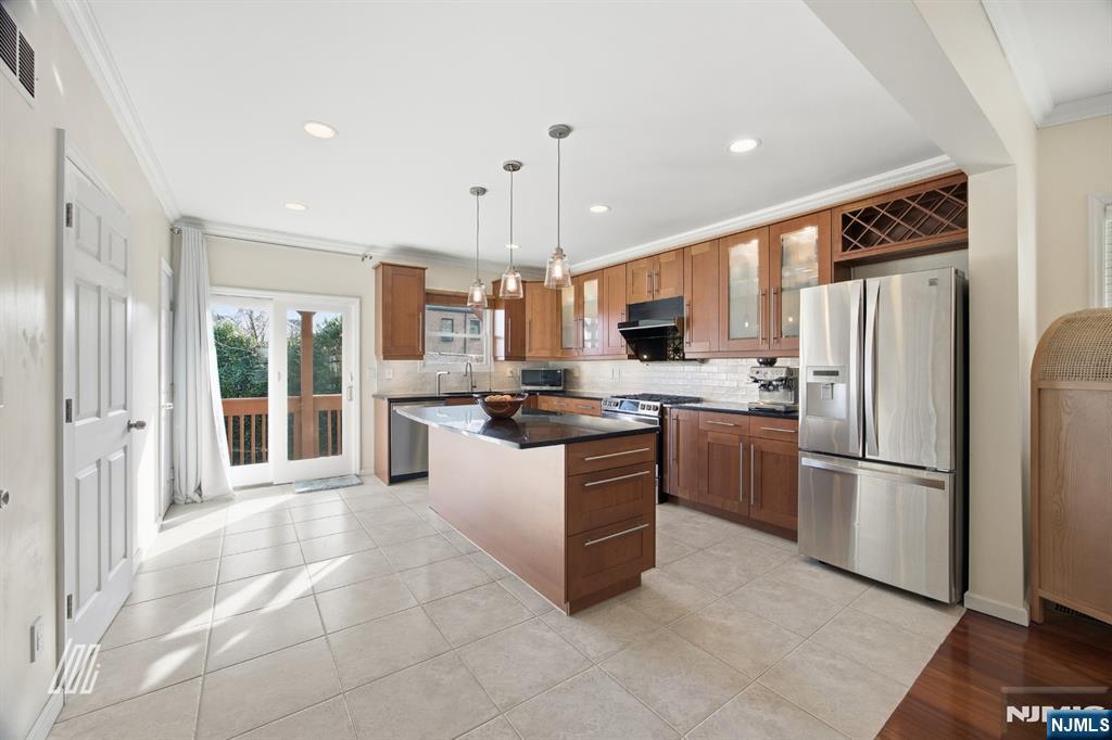 331 Undercliff Avenue Edgewater, NJ 07020 - Photo 13 of 45 a kitchen with granite countertop a refrigerator and a sink