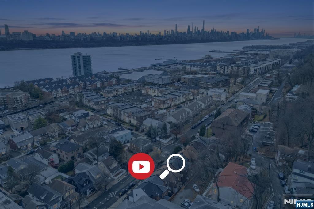 331 Undercliff Avenue Edgewater, NJ 07020 - Photo 2 of 45 a view of a street with of house