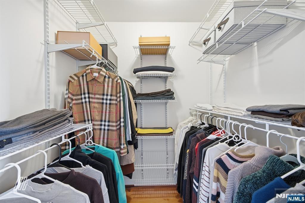 331 Undercliff Avenue Edgewater, NJ 07020 - Photo 28 of 45 a view of walk in closet with clothes and shoes