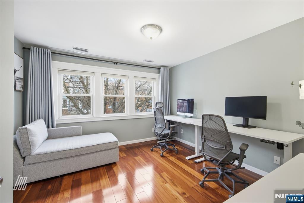 331 Undercliff Avenue Edgewater, NJ 07020 - Photo 33 of 45 a view of a workspace with furniture and a window