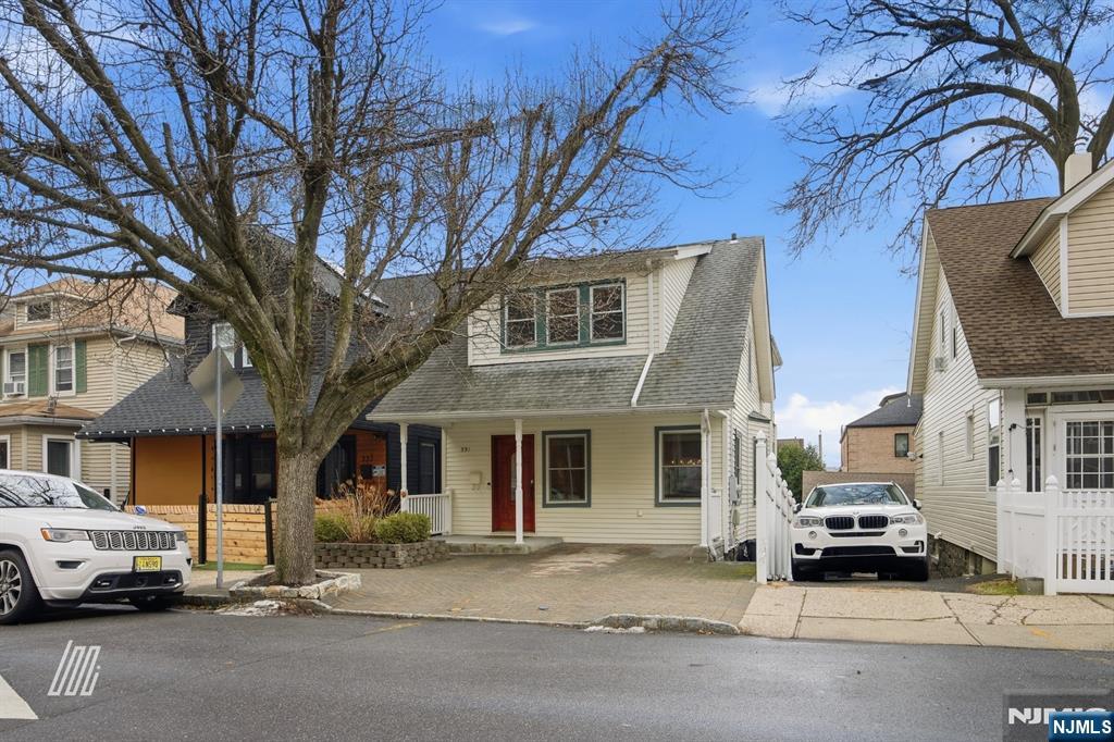 331 Undercliff Avenue Edgewater, NJ 07020 - Photo 40 of 45 a car parked in front of a building