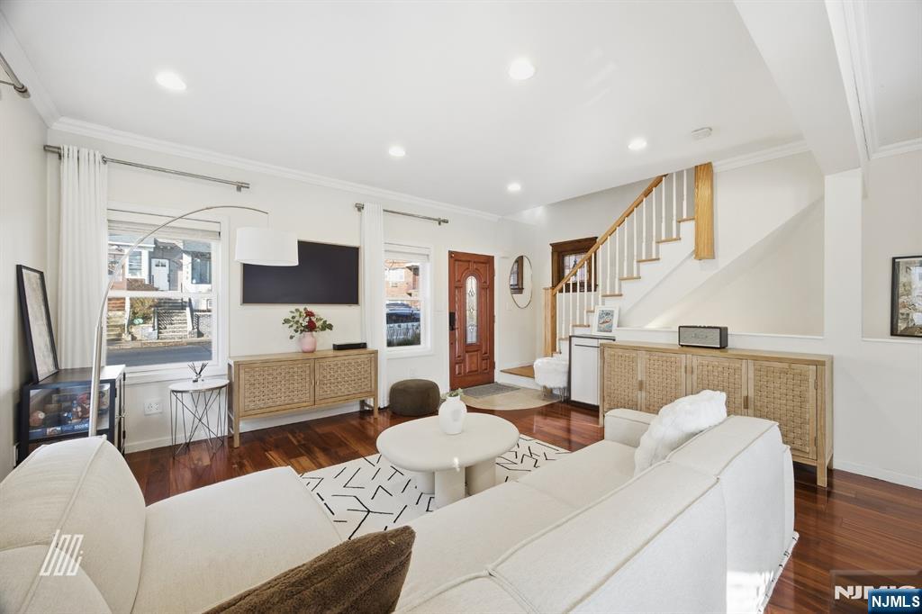 331 Undercliff Avenue Edgewater, NJ 07020 - Photo 5 of 45 a living room with furniture white walls and kitchen view