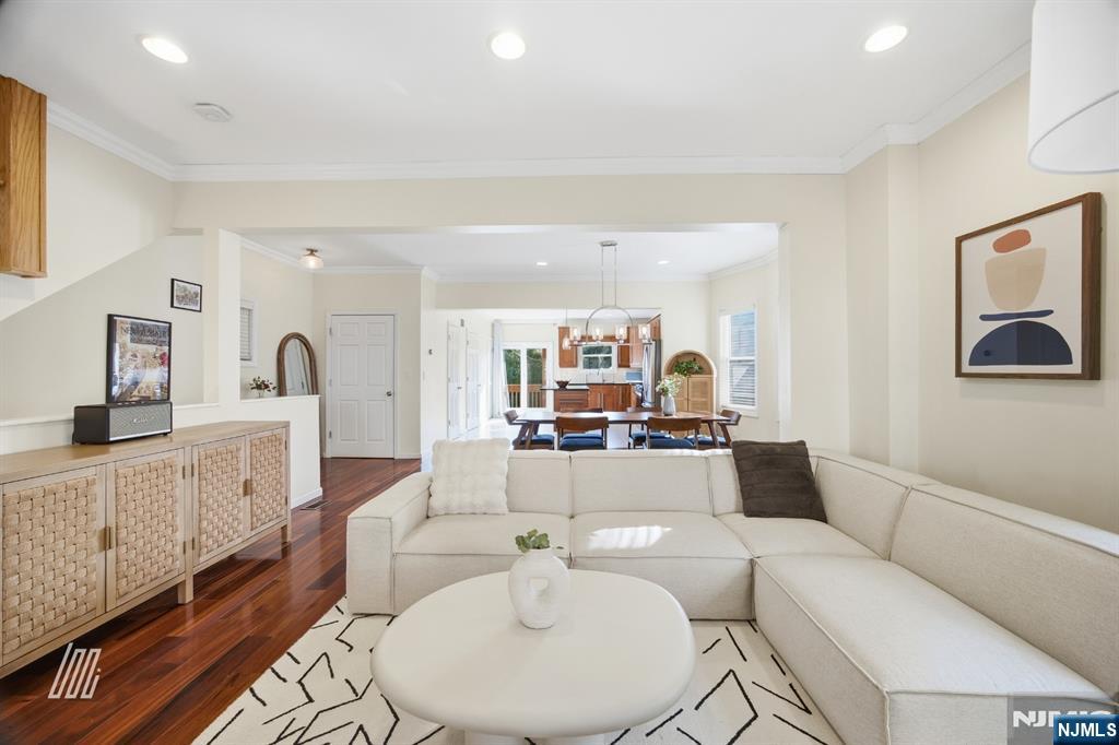 331 Undercliff Avenue Edgewater, NJ 07020 - Photo 8 of 45 a living room with furniture and a large window