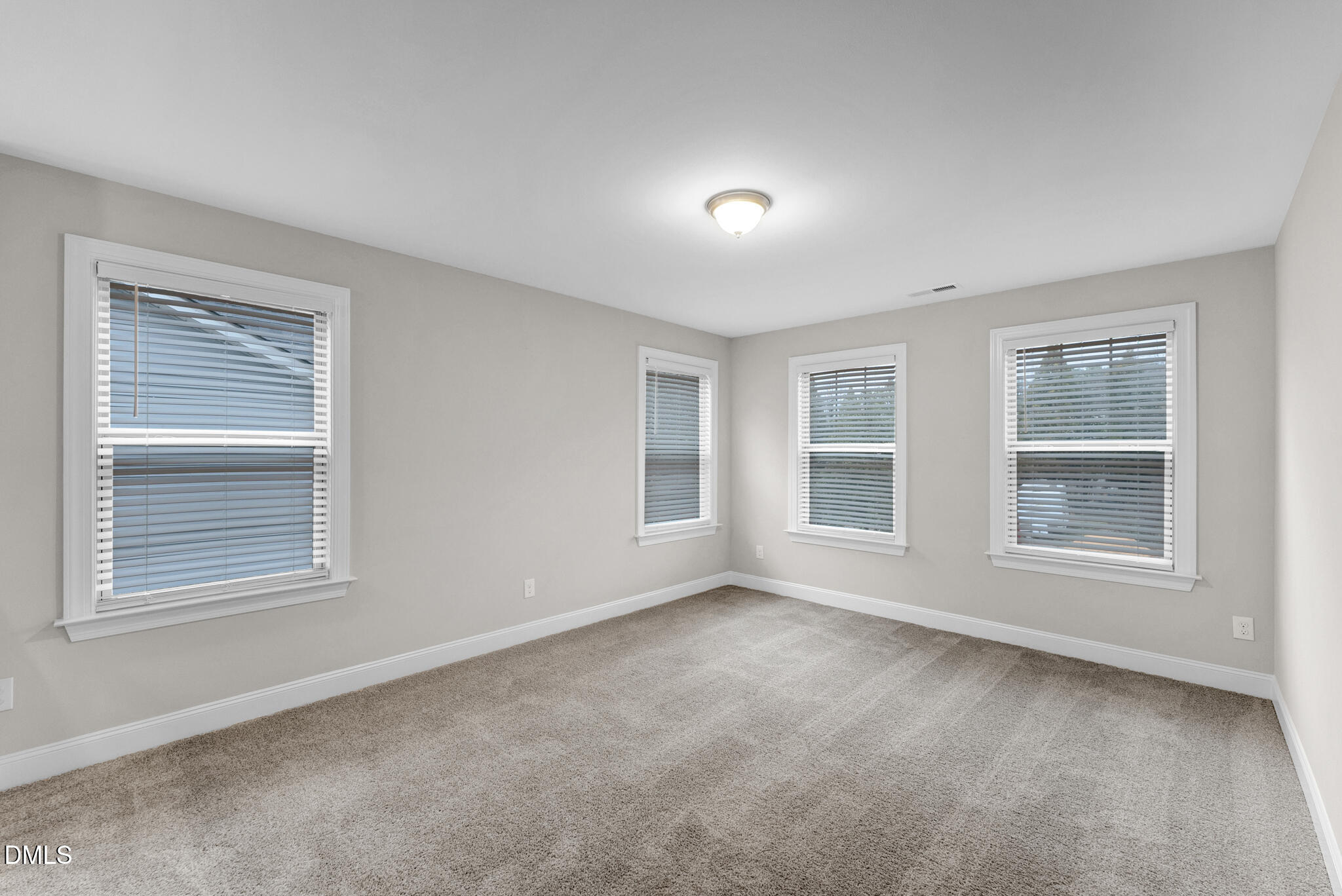 928 Barringer Drive Raleigh, NC 27606 - Photo 28 of 40 a view of an empty room with a window