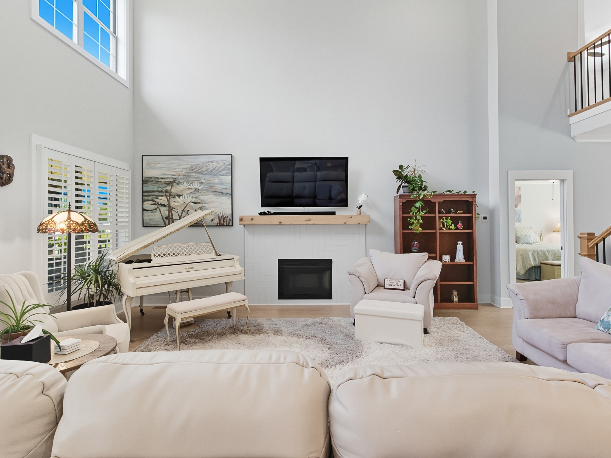 106 Watermill Lane Lebanon, TN 37087 - Photo 16 of 85 a living room with furniture a fireplace and a flat screen tv