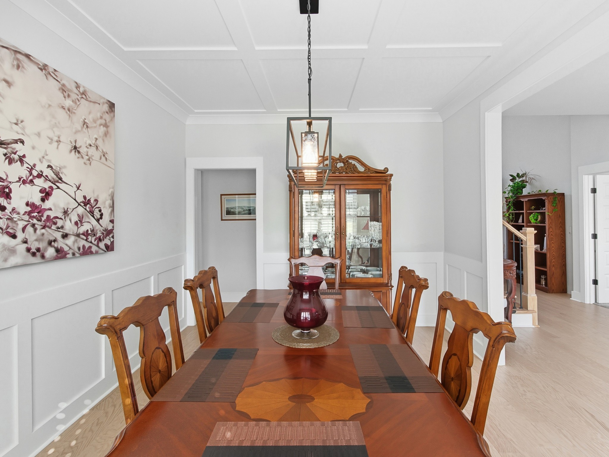 106 Watermill Lane Lebanon, TN 37087 - Photo 31 of 85 a dining room with furniture wooden floor and a chandelier