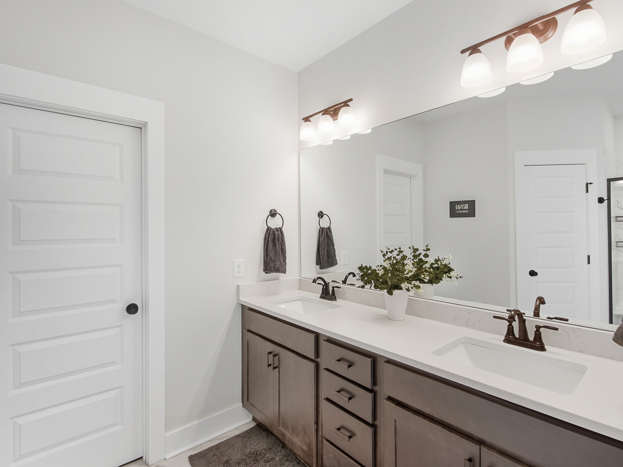 106 Watermill Lane Lebanon, TN 37087 - Photo 40 of 85 a bathroom with a double vanity sink and a mirror