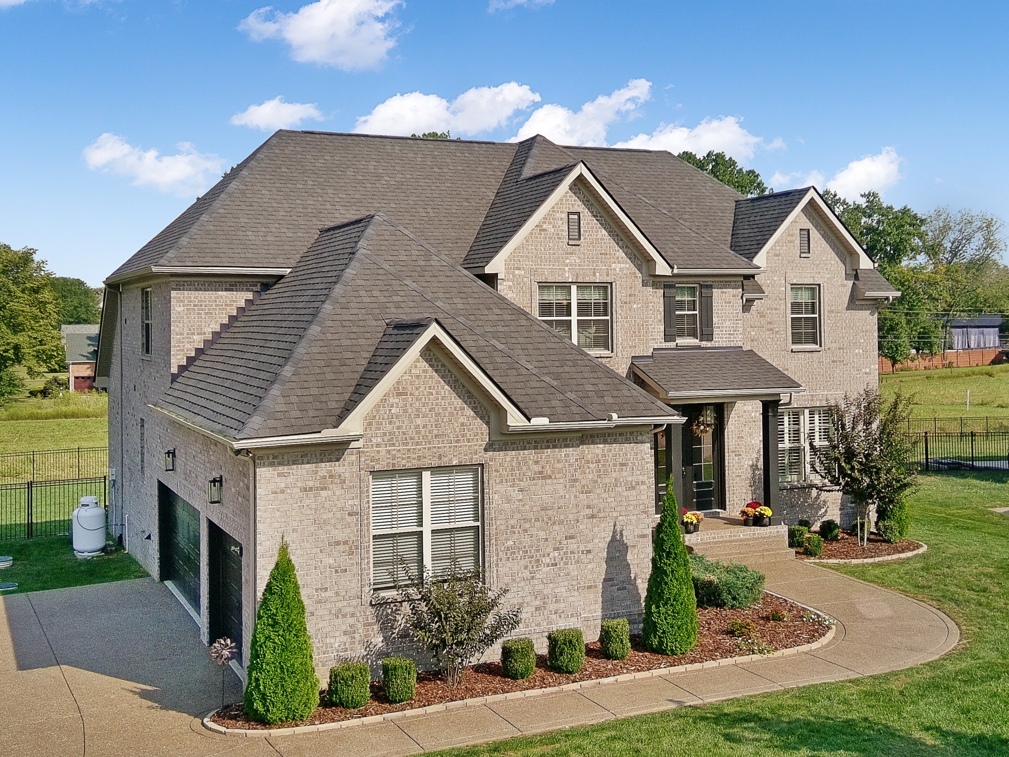 106 Watermill Lane Lebanon, TN 37087 - Photo 5 of 85 a front view of a house with garden