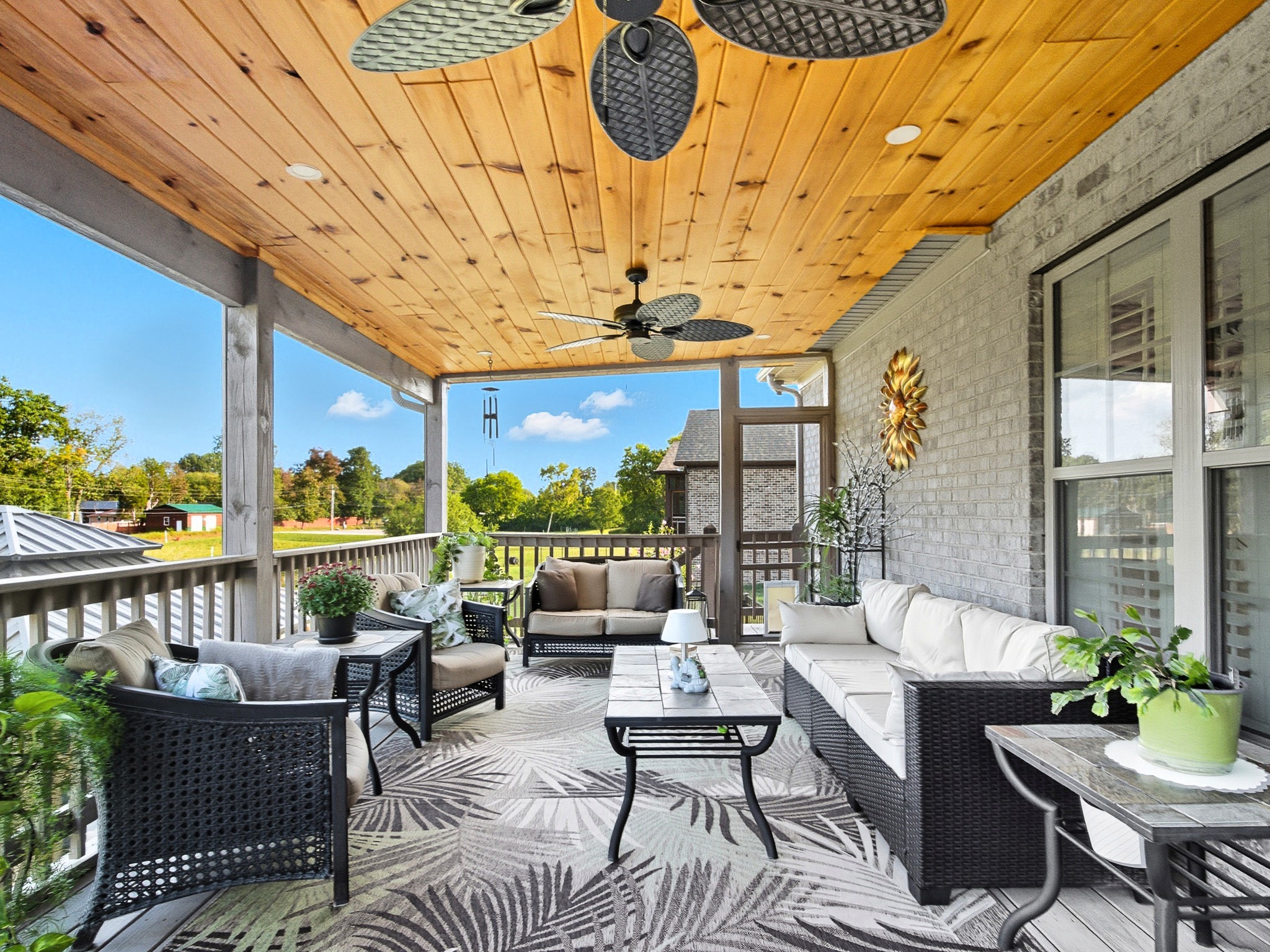 106 Watermill Lane Lebanon, TN 37087 - Photo 69 of 85 a living room with patio furniture and a floor to ceiling window