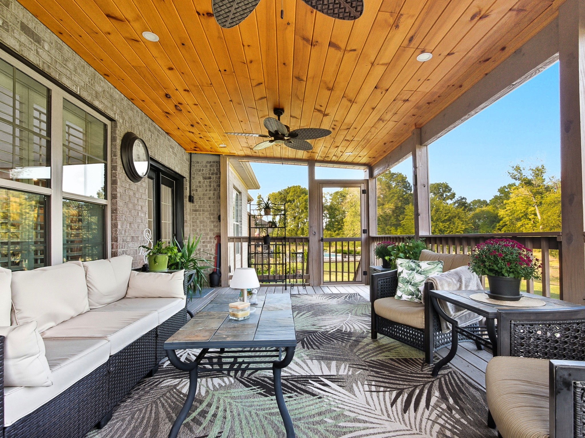 106 Watermill Lane Lebanon, TN 37087 - Photo 70 of 85 a living room with patio furniture and a floor to ceiling window