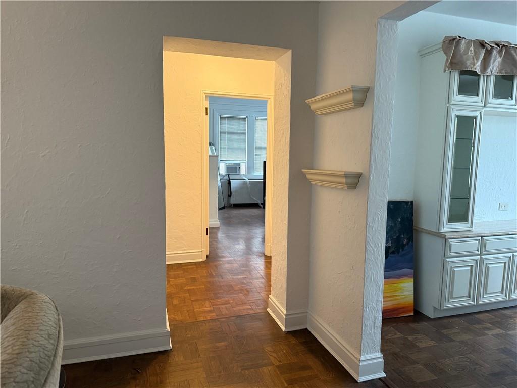 166 North Dithridge Street, Unit 2A Pittsburgh, PA 15213 - Photo 14 of 32 a view of a hallway with wooden floor and a room