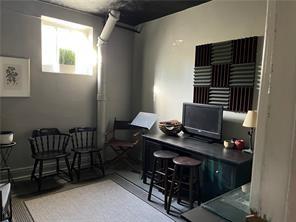 166 North Dithridge Street, Unit 2A Pittsburgh, PA 15213 - Photo 28 of 32 a workspace with furniture and window