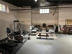 166 North Dithridge Street, Unit 2A Pittsburgh, PA 15213 - Photo 29 of 32 a living room with furniture a air conditioner vent and a window