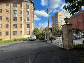 166 North Dithridge Street, Unit 2A Pittsburgh, PA 15213 - Photo 30 of 32 a view of a building with a street