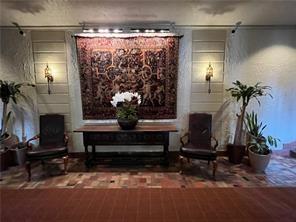 166 North Dithridge Street, Unit 2A Pittsburgh, PA 15213 - Photo 4 of 32 a living room with furniture a fireplace and a potted plant