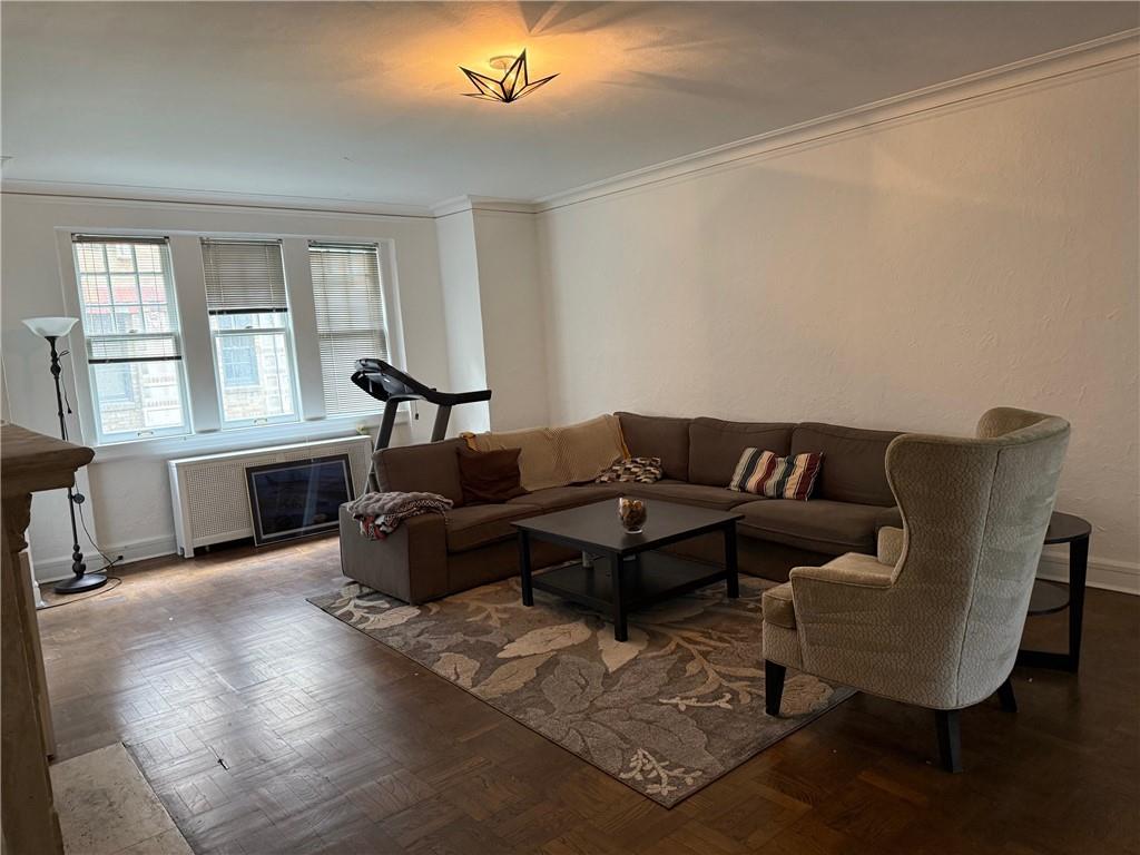 166 North Dithridge Street, Unit 2A Pittsburgh, PA 15213 - Photo 7 of 32 a living room with furniture and wooden floor