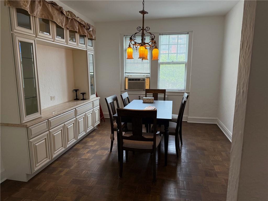 166 North Dithridge Street, Unit 2A Pittsburgh, PA 15213 - Photo 8 of 32 a view of a dining room with furniture window and wooden floor