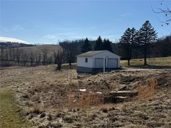a house view with a backyard space