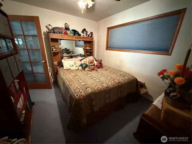 a bathroom with a double vanity sink and mirror