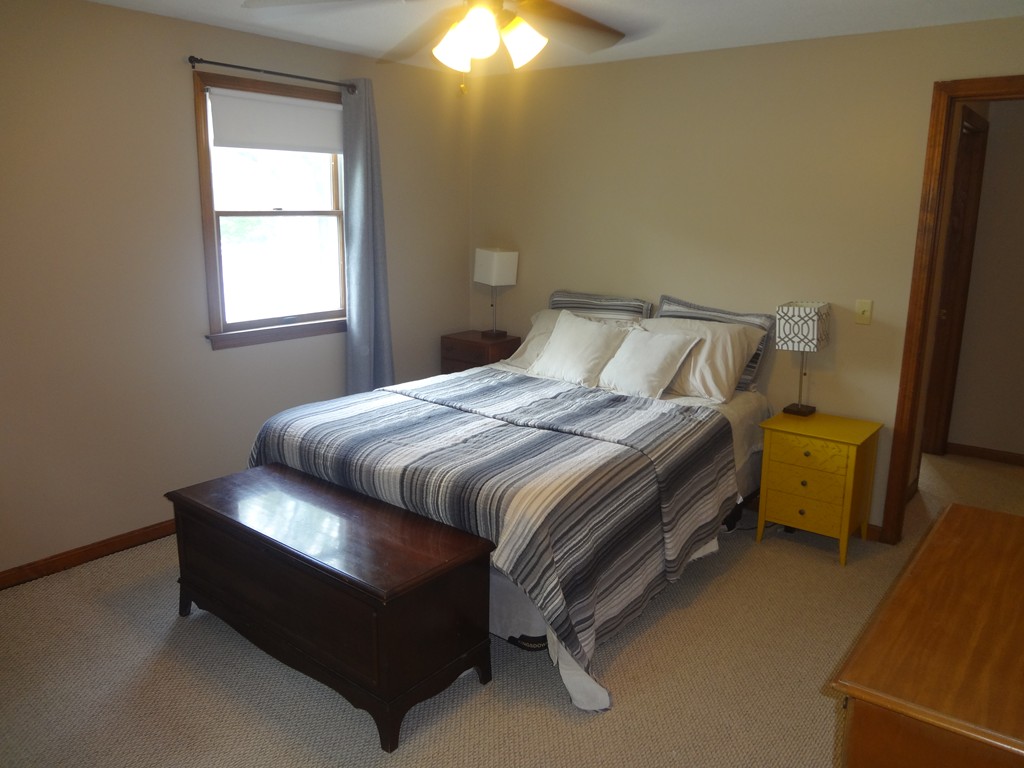 129-131 Merida Street Springfield, MA 01104 - Photo 11 of 25 a bedroom with a bed and a window