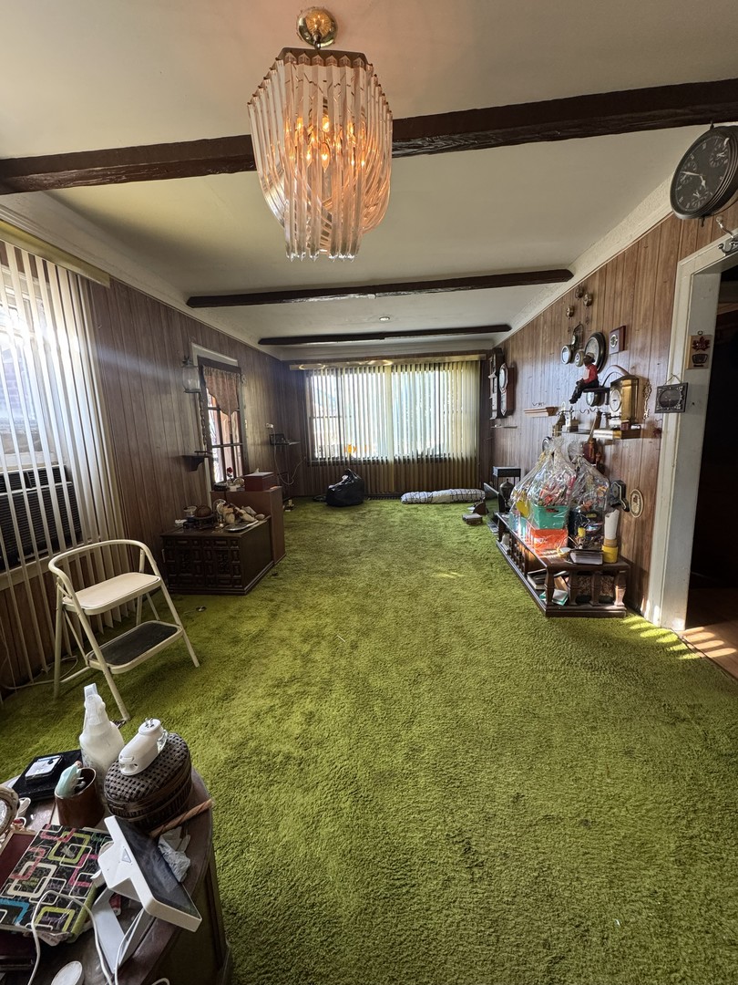 8239 South Ridgeland Avenue Chicago, IL 60617 - Photo 2 of 16 a view of a room with gym equipment