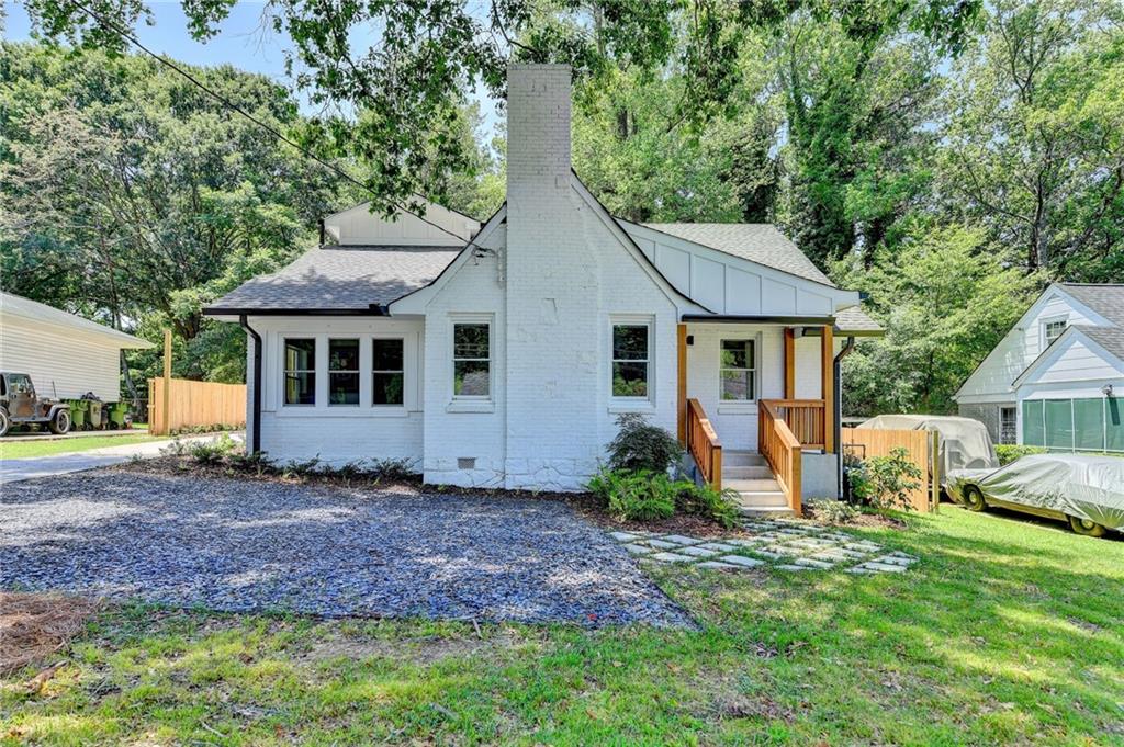 1900 Beecher Road Southwest Atlanta, GA 30310 - Photo 1 of 1 a house that has a lot of plants in it