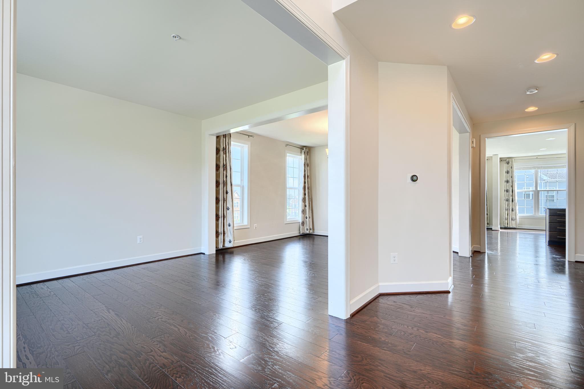 10819 White Trillium Road Perry Hall, MD 21128 - Photo 3 of 47 a view of a hallway with wooden floor