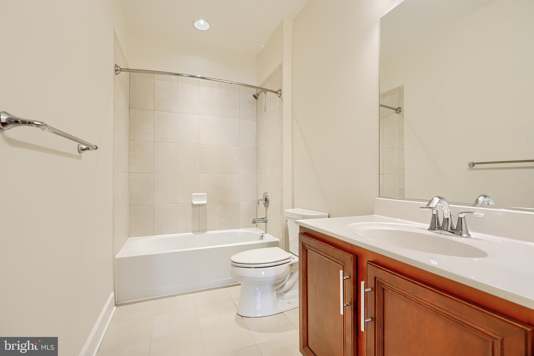 10819 White Trillium Road Perry Hall, MD 21128 - Photo 41 of 47 a bathroom with a sink a toilet and shower
