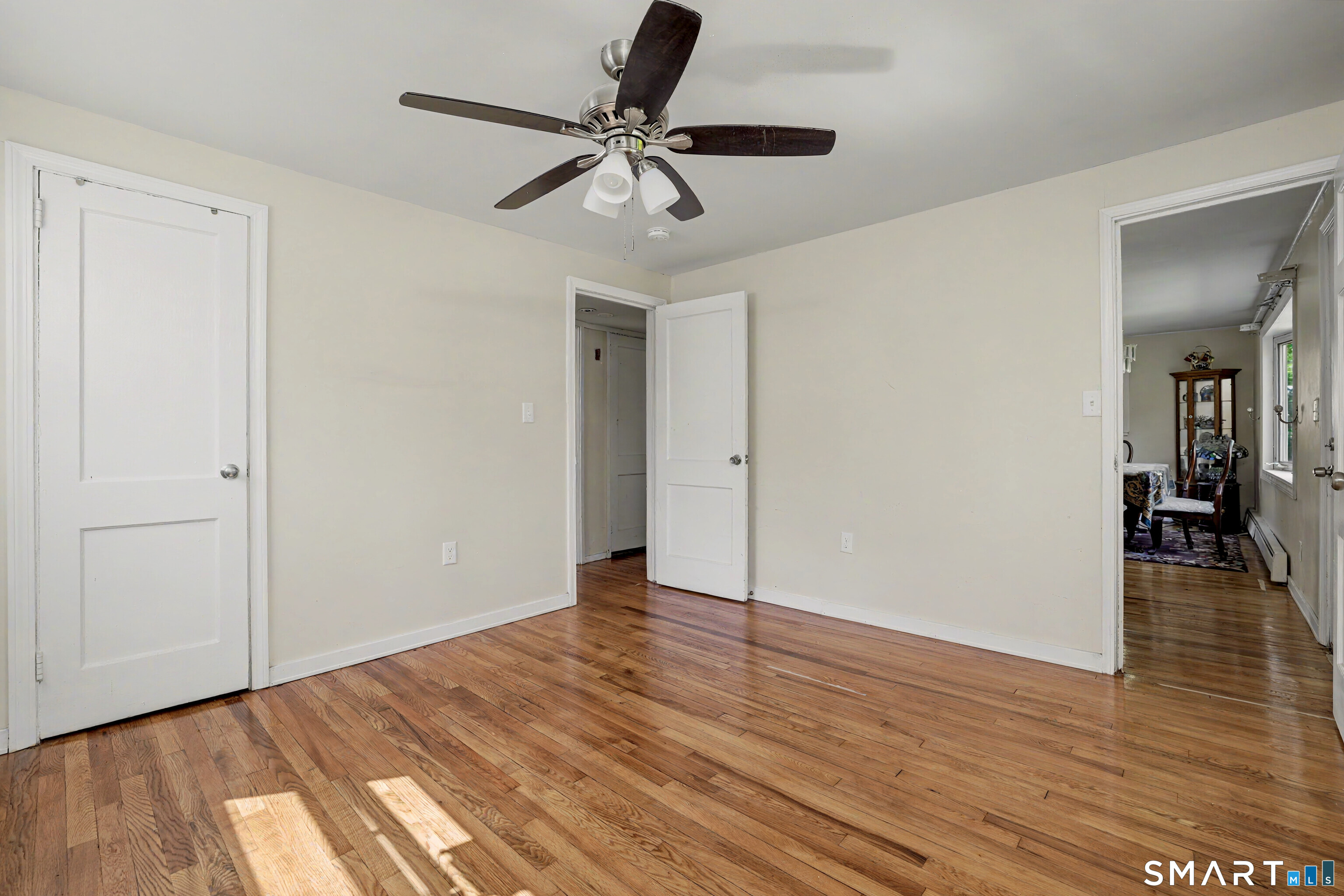 97 Boothbay Street Bloomfield, CT 06002 - Photo 17 of 33 a view of empty room with wooden floor