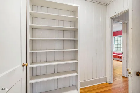 a view of a room with shelves