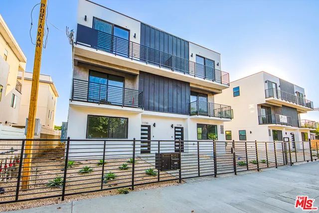 a view of a house with a garage