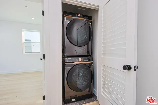 a bathroom with a sink a toilet and bathtub