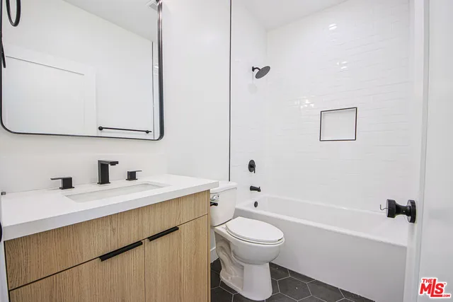 a view of balcony with two chairs and a table