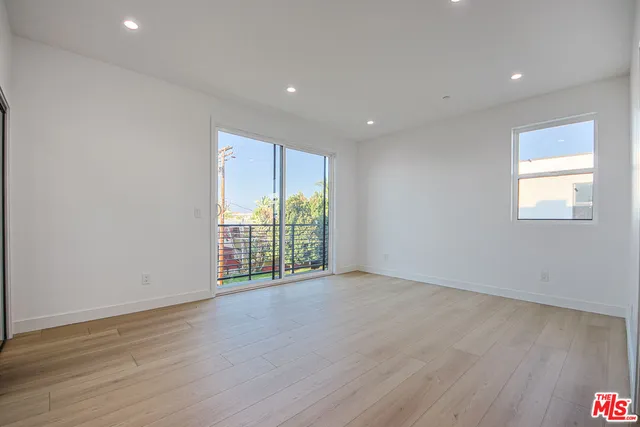 a view of a hallway with closet
