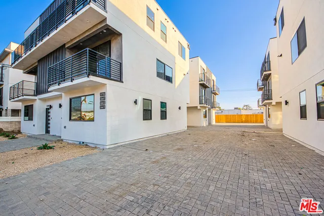 a view of a street with buildings