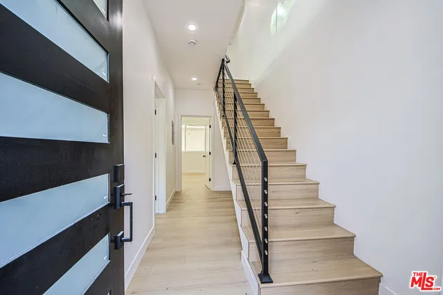 a bathroom with a sink a toilet and a bathtub