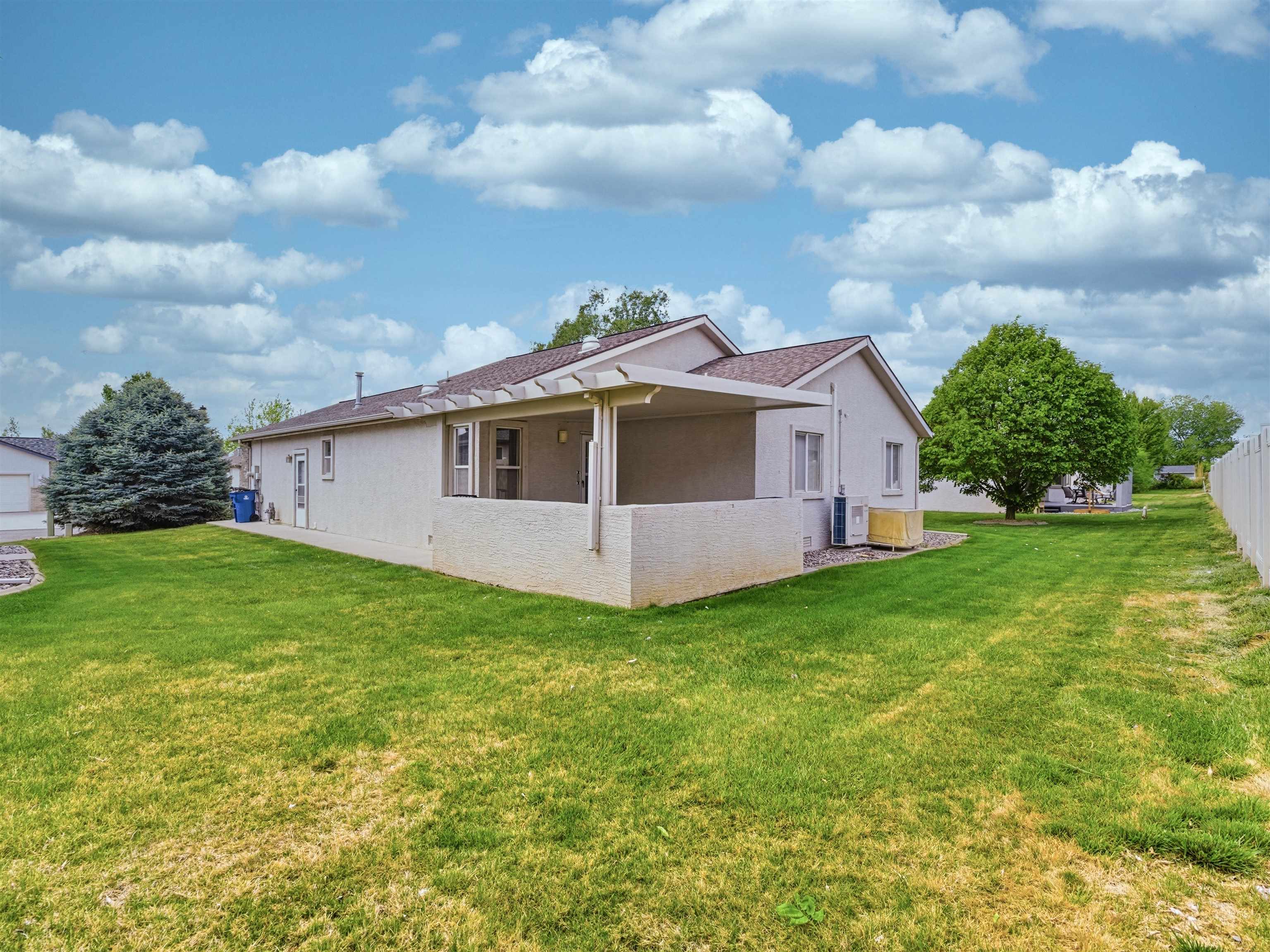 3082 Shadowbrook Court Grand Junction, CO 81504 - Photo 25 of 28 a view of a backyard of the house