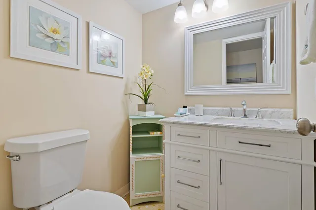 a view of a balcony with lake view and a floor to ceiling window