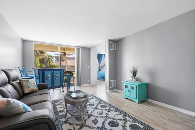 wooden floor that has a window and a wooden floor