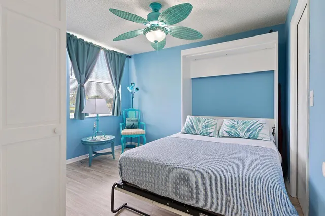 a room with furniture and flat screen tv