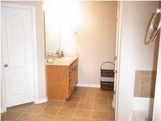 7564 Loop Street Navarre, FL 32566 - Photo 12 of 15 Master Bath With Two Individual Vanity Areaa