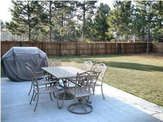 7564 Loop Street Navarre, FL 32566 - Photo 15 of 15 Large Concrete Patio