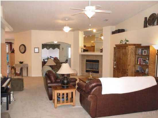 7564 Loop Street Navarre, FL 32566 - Photo 6 of 15 Spacious Family Room With Corner Fireplace