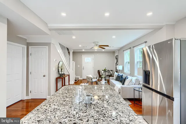 a very nice looking living room with a large window