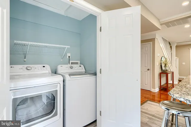a utility room with dryer and washer